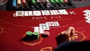 Jackpot slot game reels lighting up with a big prize win